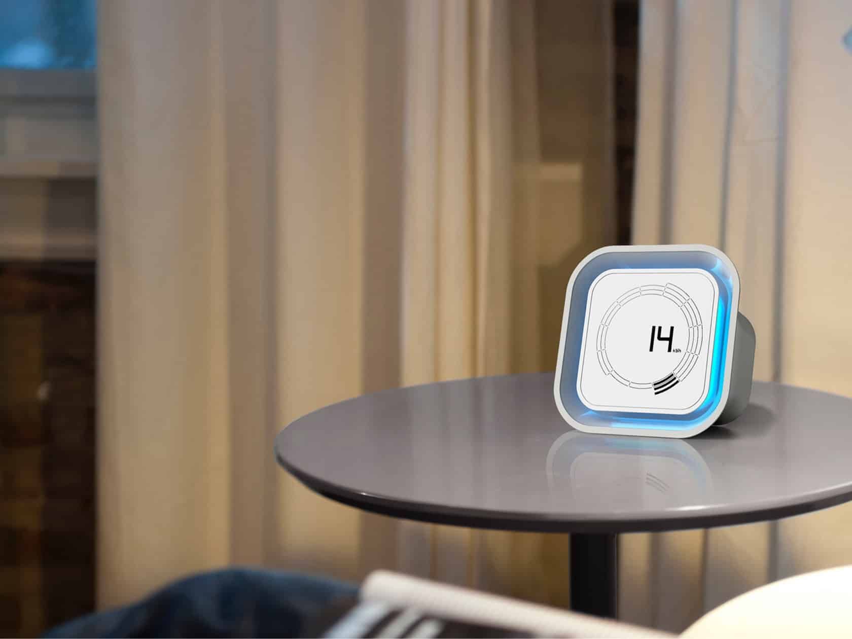 Ge Home Energy Glowing Energy Monitor On Round Side Table