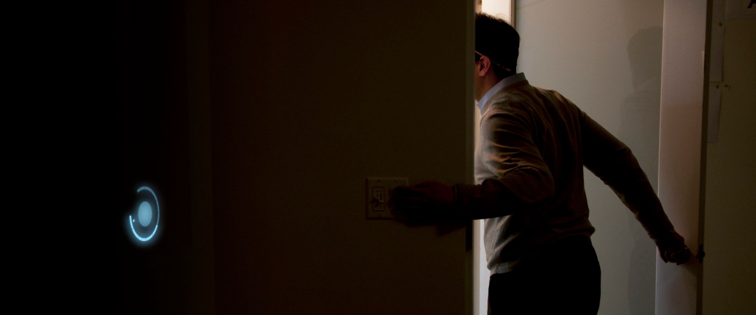 Ge Home Energy Person Running Past Glowing Wall Interface